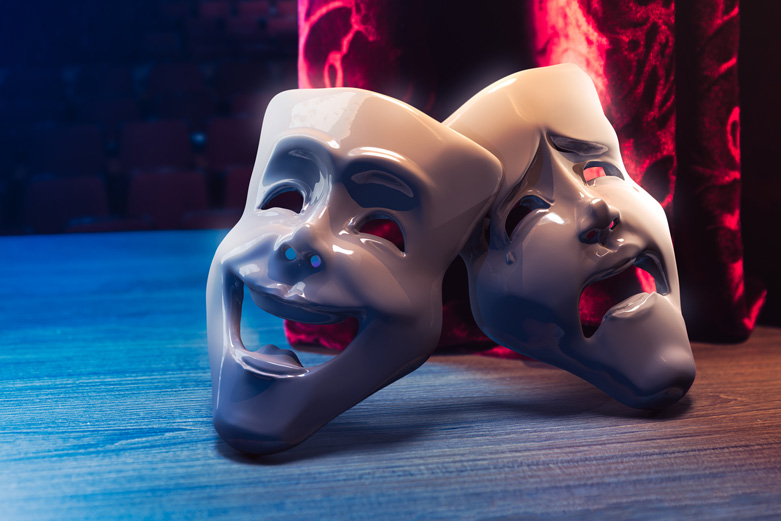 Couple of theater mask over the stage