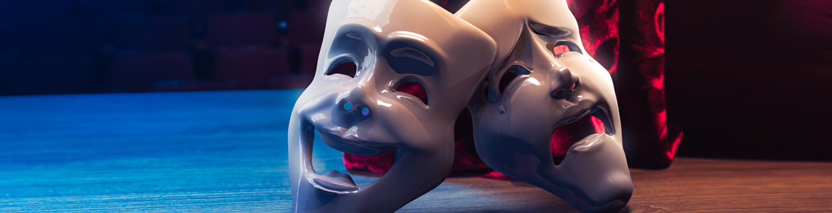 Couple of theater mask over the stage